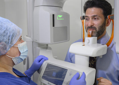 patient using cone beam ct scanner
